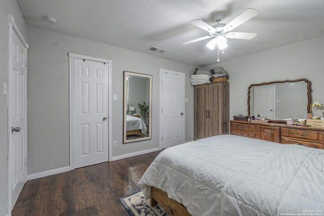 bedroom featuring ceiling fan and dark wood-type flooring