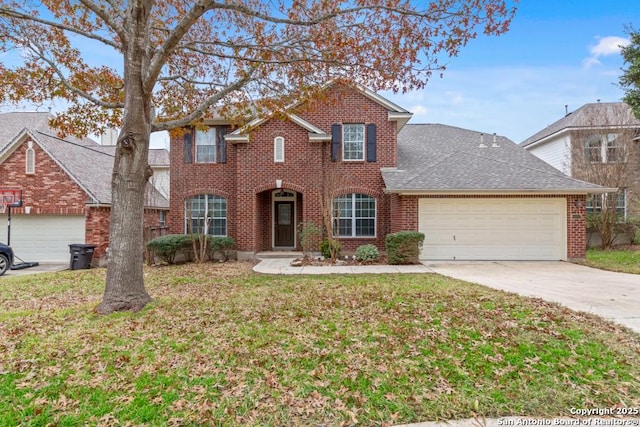 front of property with a front yard and a garage