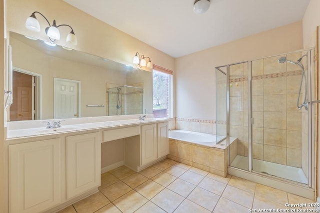 bathroom with tile patterned floors, vanity, and independent shower and bath