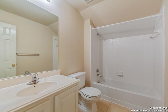 full bathroom with toilet, vanity, vaulted ceiling, tile patterned floors, and washtub / shower combination