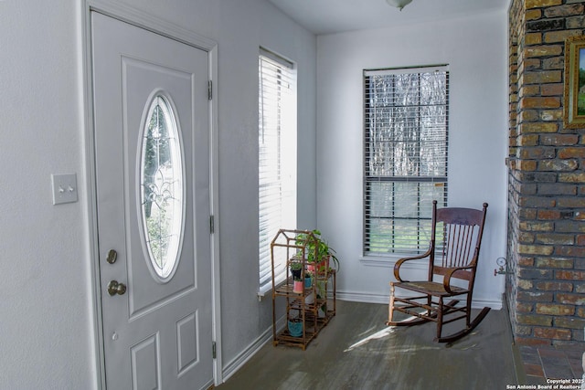 foyer featuring dark hardwood / wood-style floors