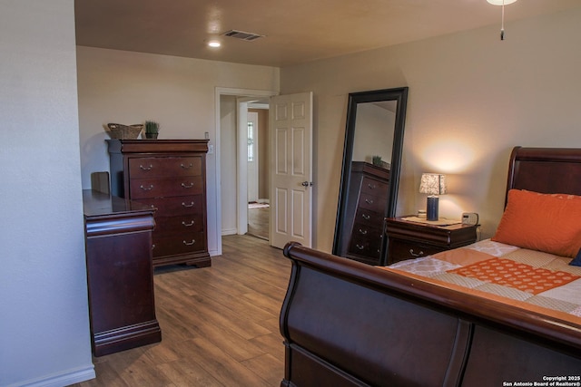 bedroom featuring hardwood / wood-style floors