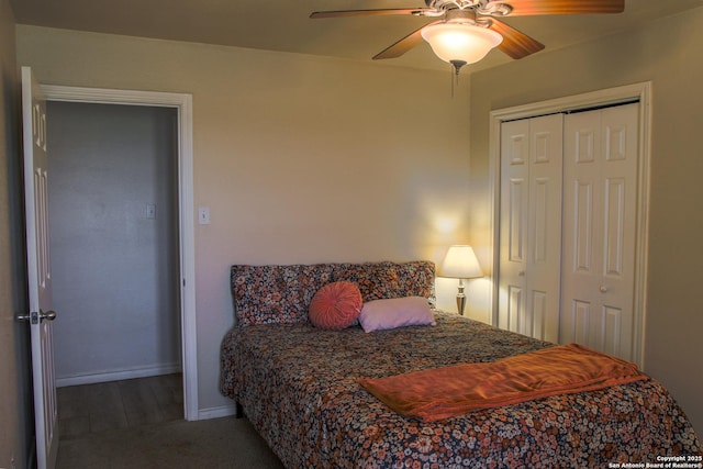 bedroom featuring ceiling fan, a closet, and carpet flooring