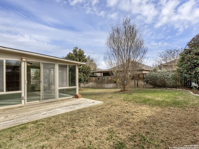 view of yard with a sunroom