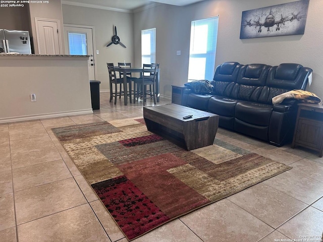 tiled living room with crown molding