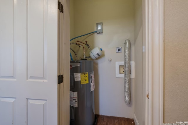 utility room with water heater