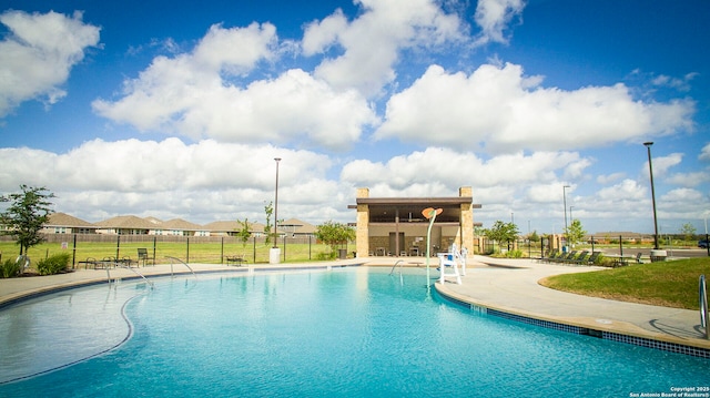 view of pool with a patio area