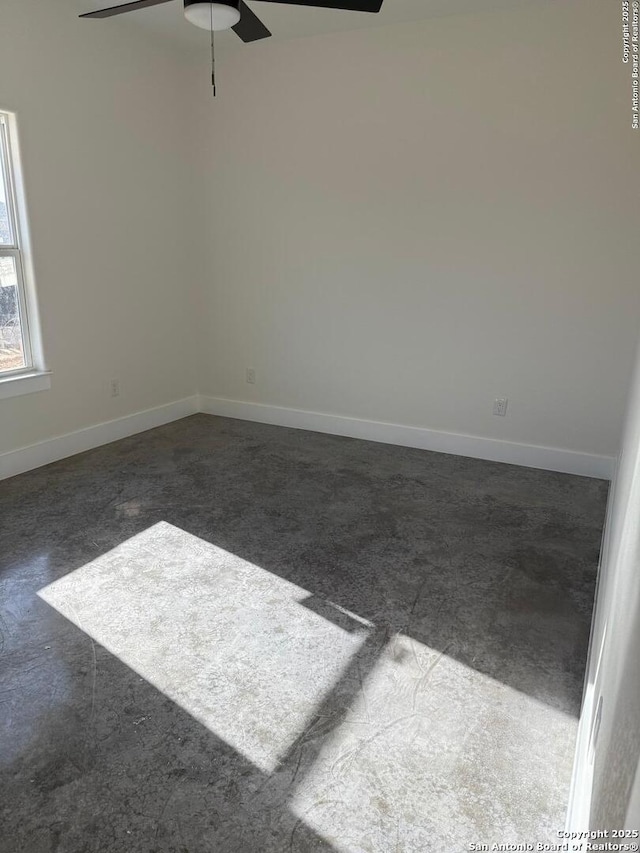 unfurnished room with ceiling fan