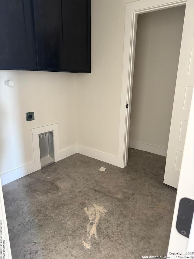 laundry room featuring cabinets and electric dryer hookup