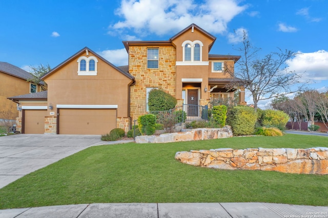 view of front of property with a front yard and a garage