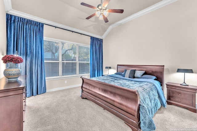 bedroom with ceiling fan, carpet floors, crown molding, and vaulted ceiling