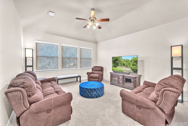 living room with light carpet, ceiling fan, and lofted ceiling