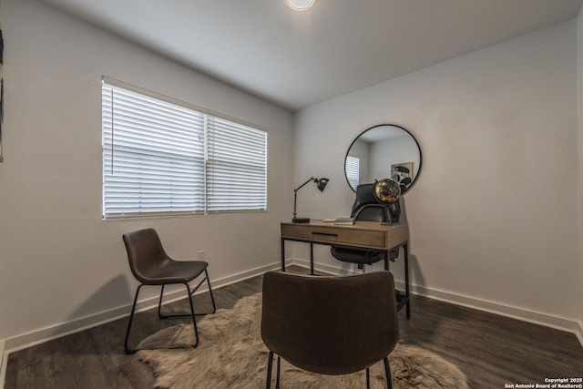 office with dark wood-type flooring