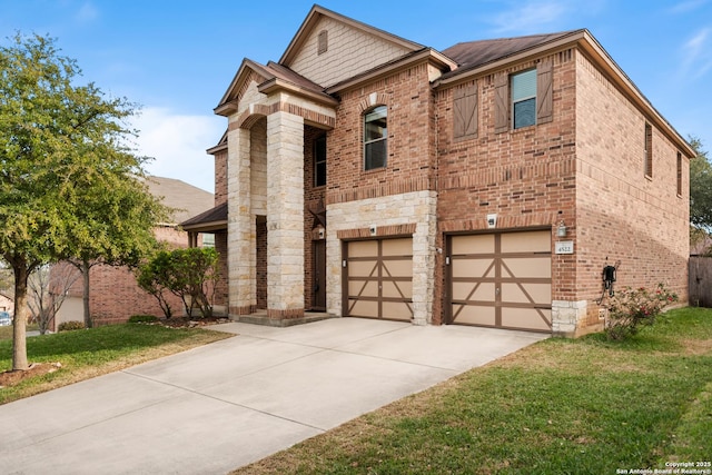 view of front of home featuring a garage and a front lawn