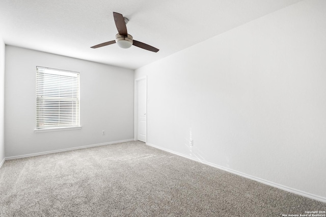 unfurnished room featuring carpet floors and ceiling fan