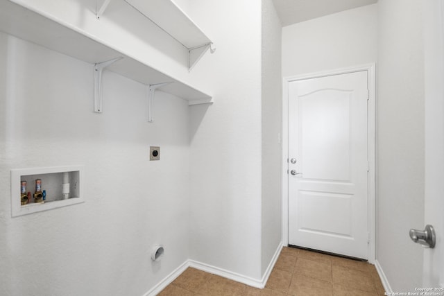 clothes washing area featuring washer hookup and electric dryer hookup