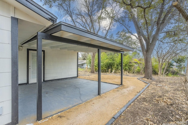 view of patio featuring a carport