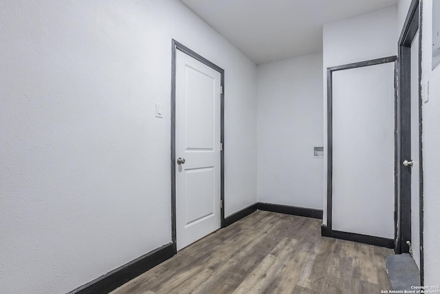 hall featuring dark wood-type flooring