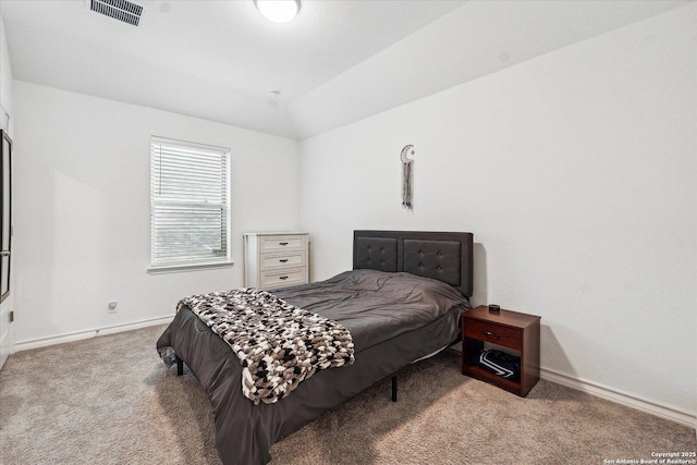 bedroom with carpet and lofted ceiling