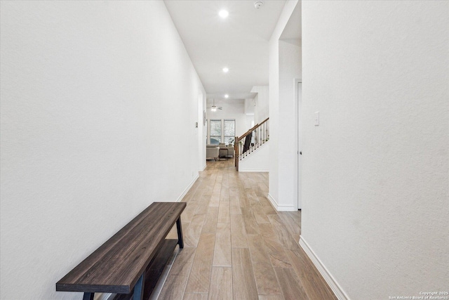 corridor featuring light hardwood / wood-style flooring