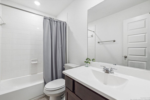 full bathroom featuring toilet, vanity, and shower / tub combo with curtain