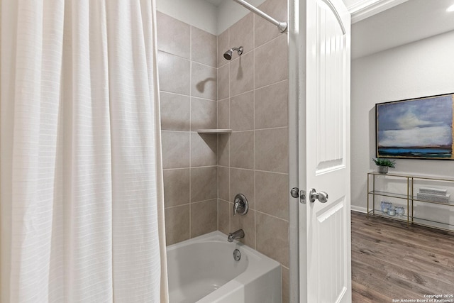 bathroom with wood-type flooring and shower / bath combination with curtain