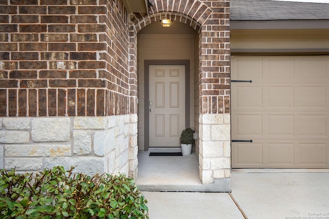 entrance to property with a garage