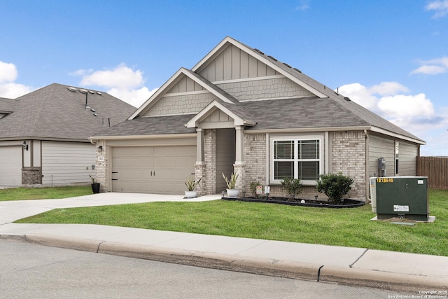 view of front of home with a front lawn and a garage