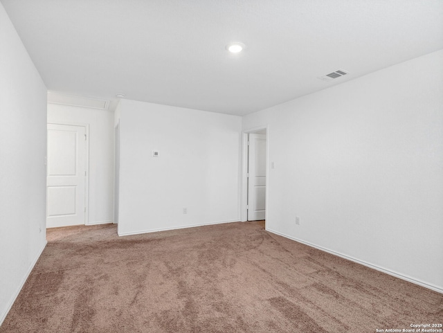 unfurnished room with carpet flooring