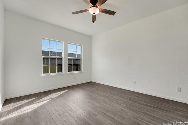 spare room featuring ceiling fan and wood-type flooring