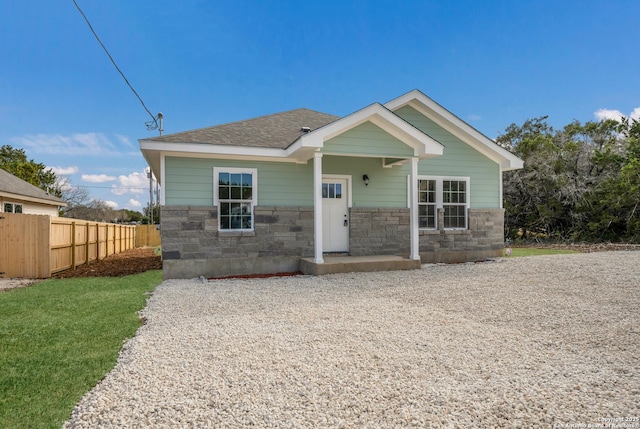 view of front of home with a front lawn