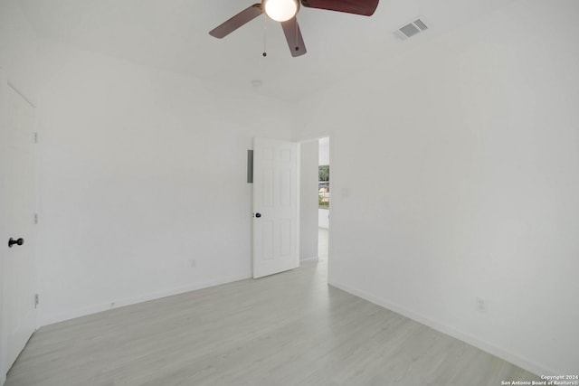 unfurnished room featuring ceiling fan and light hardwood / wood-style floors