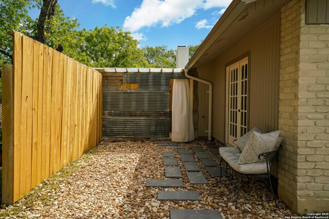 view of patio featuring french doors