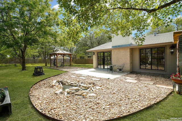 view of yard with a patio area and a gazebo