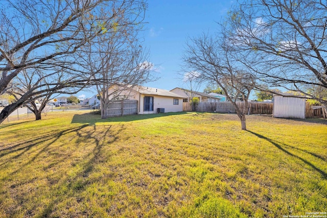 view of yard with a storage shed