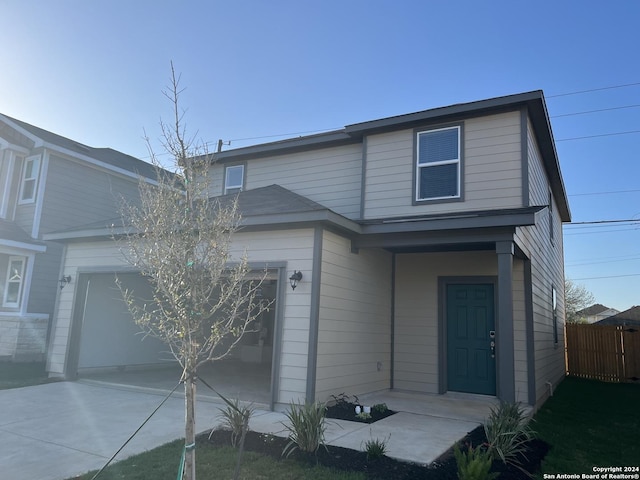 view of property featuring a garage