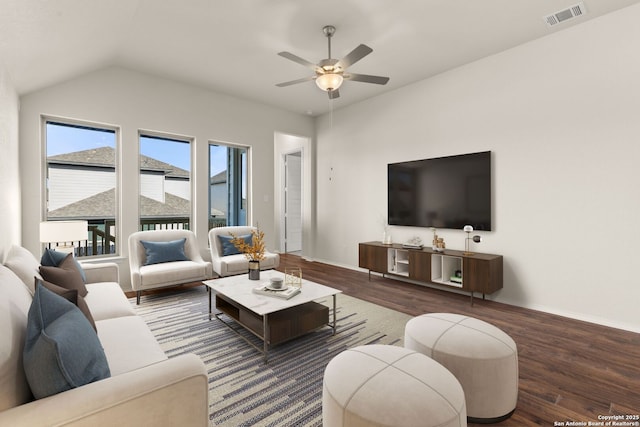 living room with ceiling fan, lofted ceiling, and dark hardwood / wood-style floors