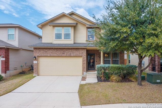 view of front of home with a garage