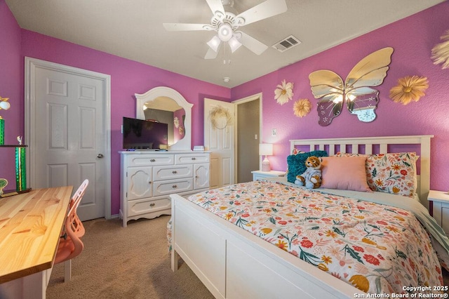 bedroom featuring ceiling fan and light colored carpet