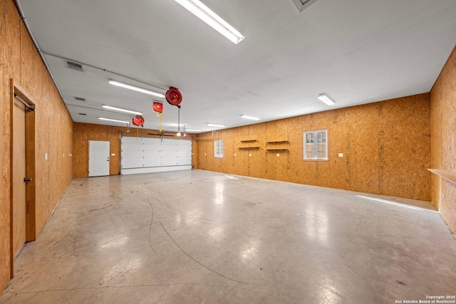 garage with wooden walls