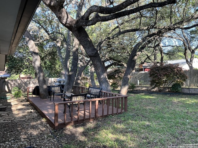 view of yard with a deck