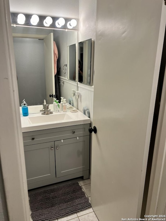 bathroom featuring vanity and tile patterned flooring