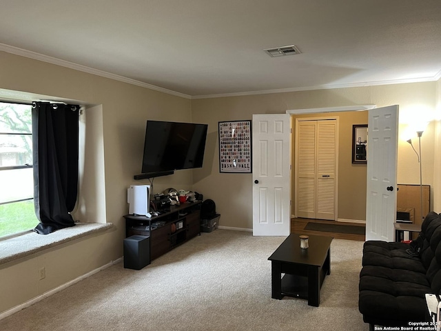 carpeted living room with crown molding