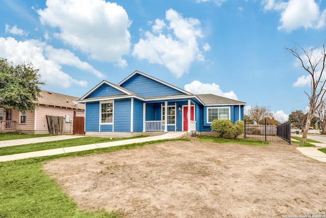 ranch-style house with covered porch