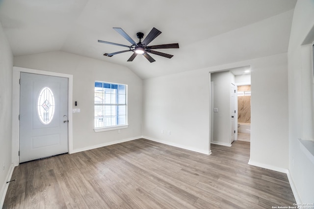 entryway featuring vaulted ceiling, ceiling fan, and light hardwood / wood-style floors