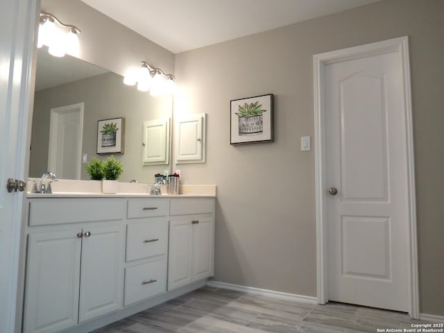 bathroom featuring vanity