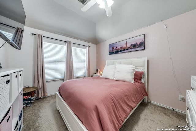 bedroom featuring light colored carpet and ceiling fan