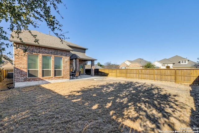 back of property with a patio area