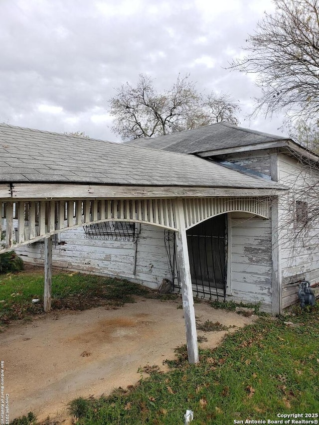 exterior space with an outbuilding