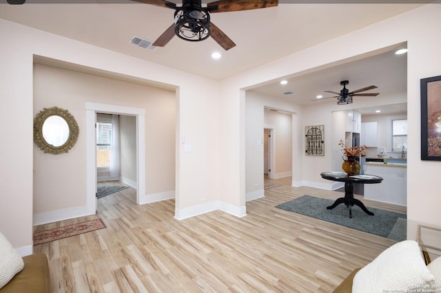 living room with light hardwood / wood-style floors